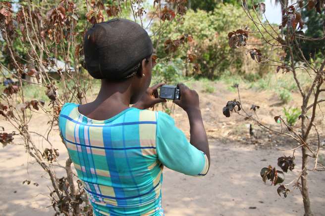 Pauline using her camera 